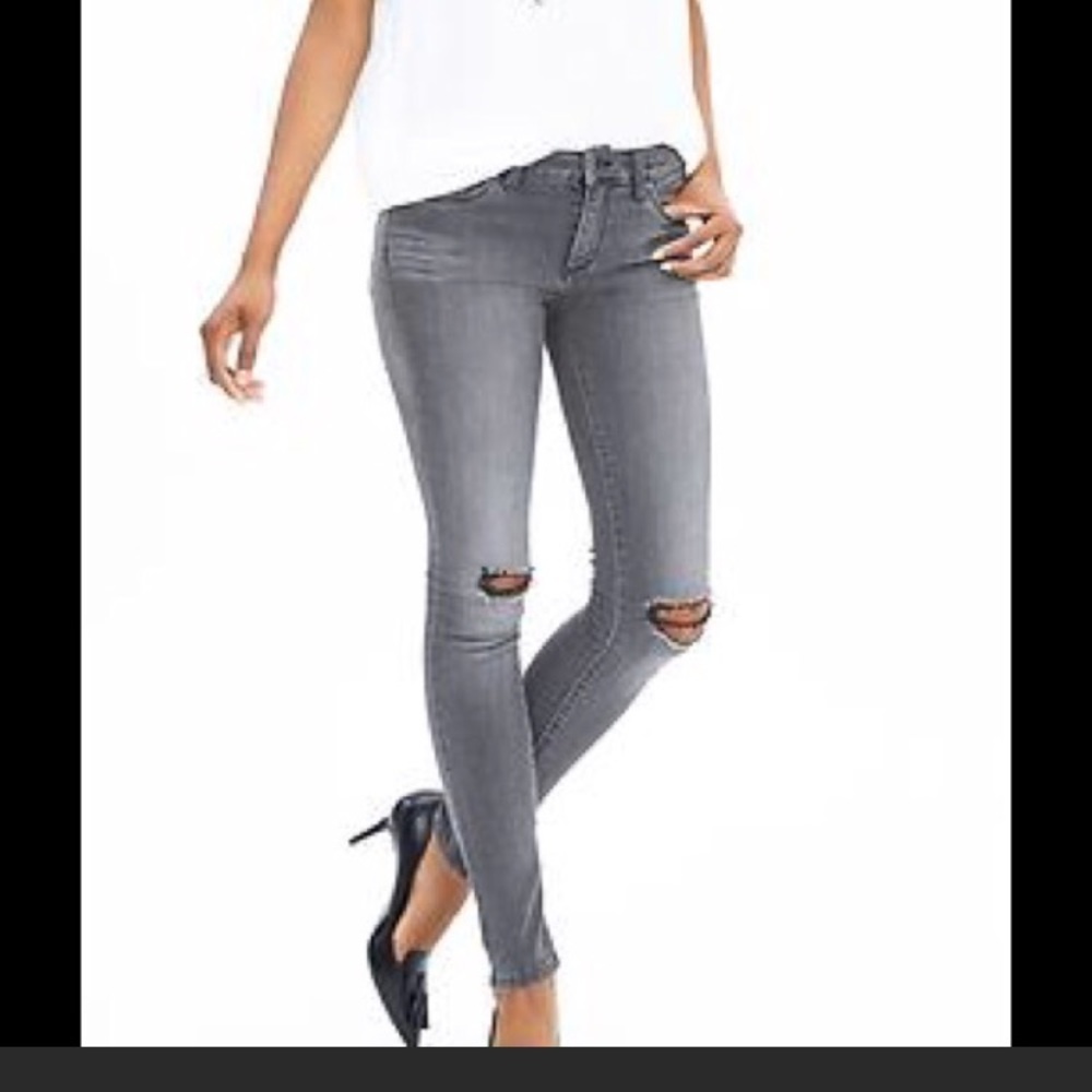 Distressed dark grey jeans
